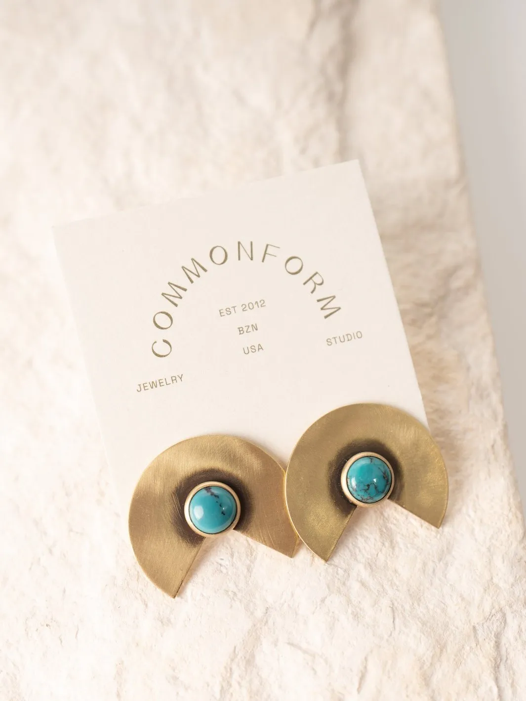Delta Stud Earrings
