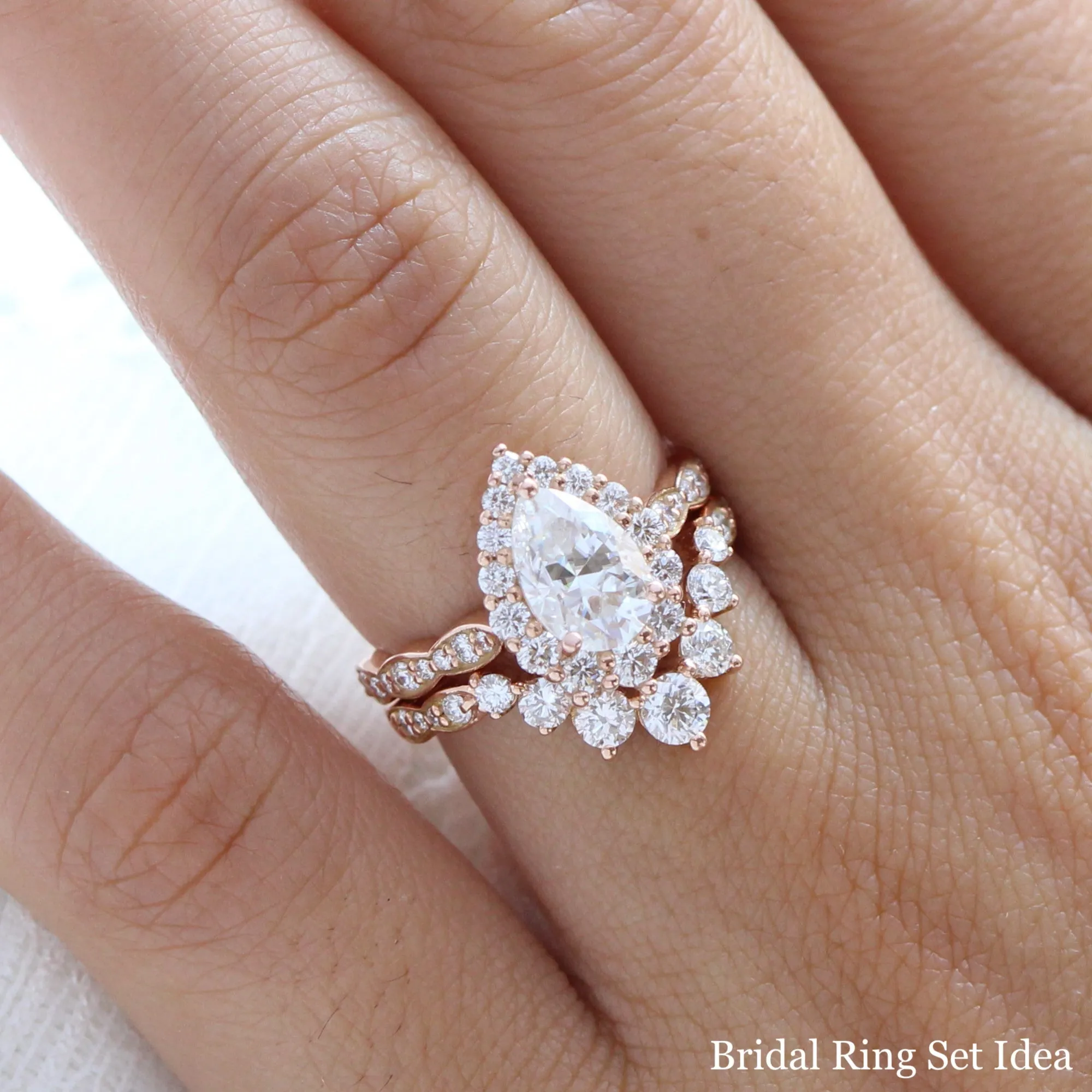 Large Pear Moissanite Engagement Ring in Tiara Halo Diamond Scalloped Band