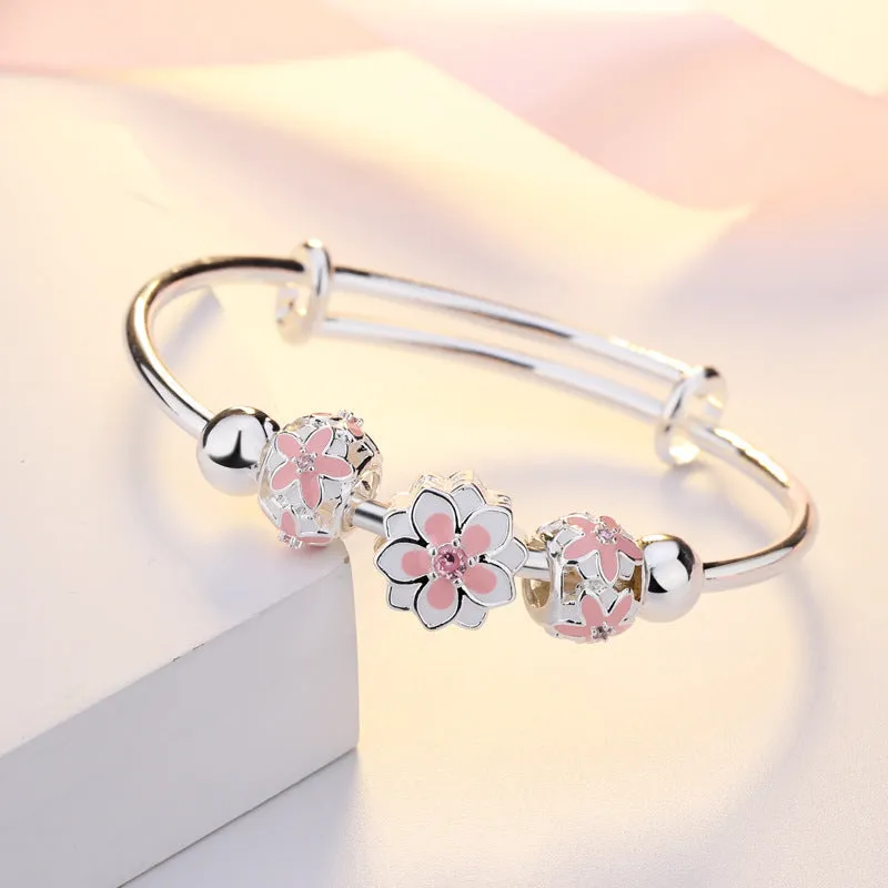 Rotating Copper Swan Bead Silver Bangle Bracelet