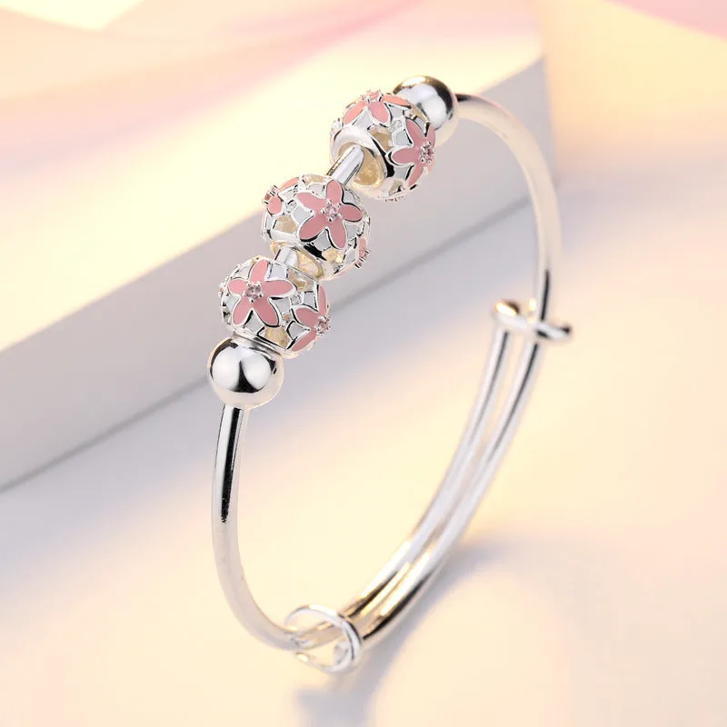 Rotating Copper Swan Bead Silver Bangle Bracelet